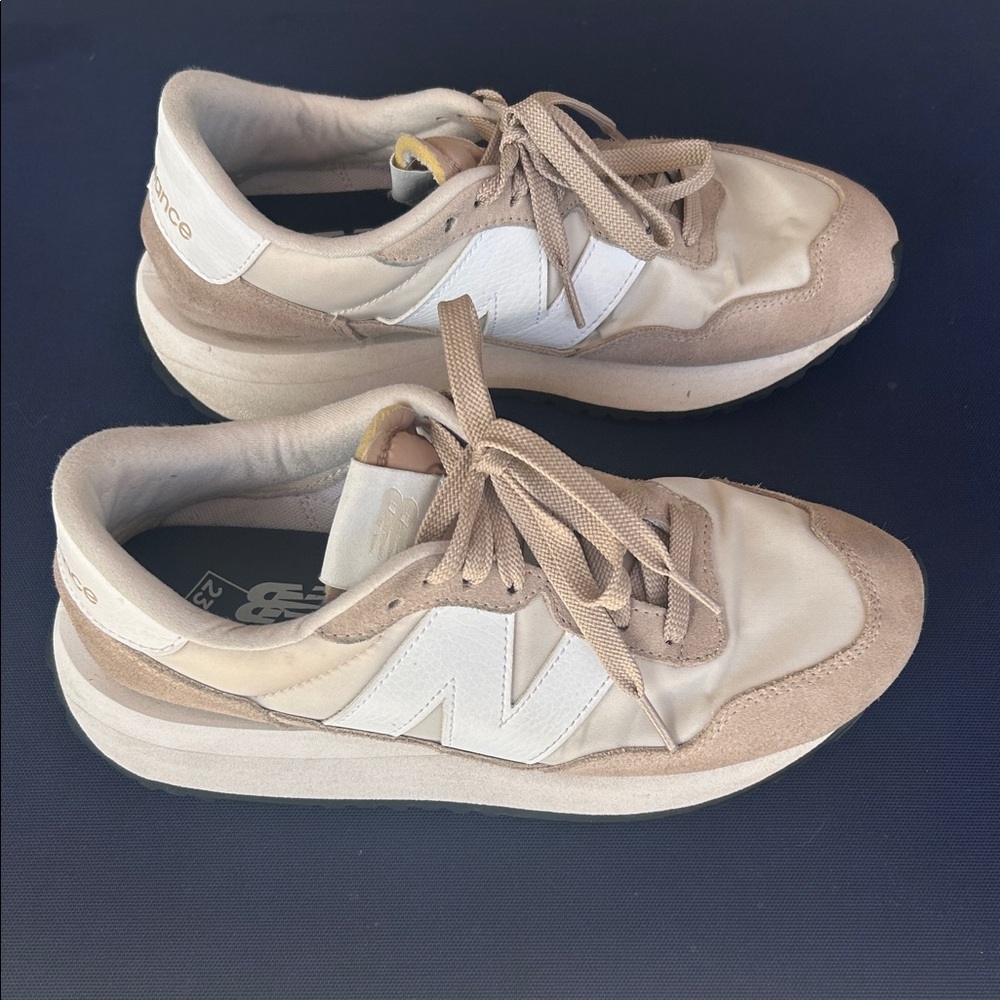 New Balance Women’s Beige and White Sneakers